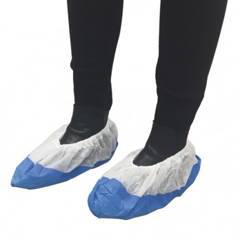 Surchaussure blanche avec semelle anti-dérapante bleue